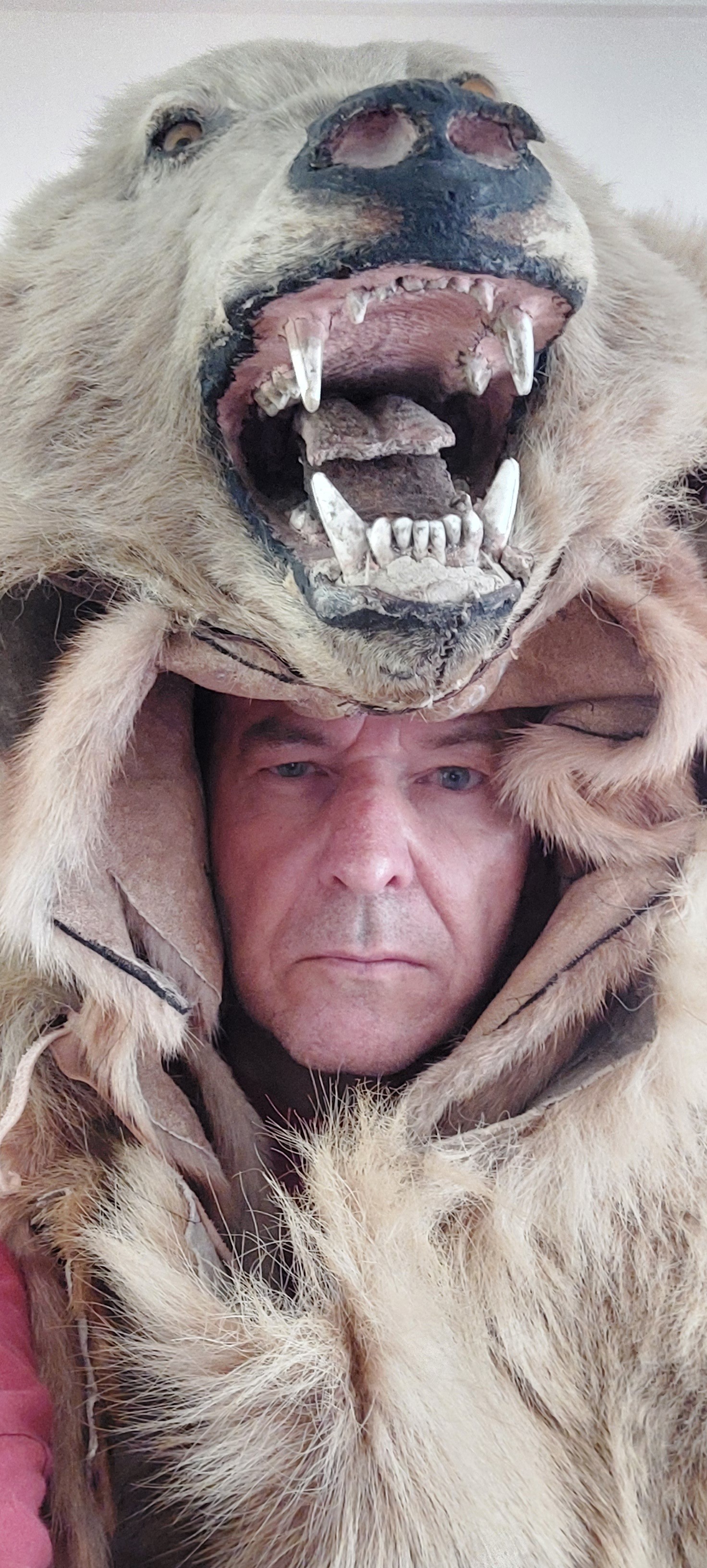 Sean Beech - Founder & Owner of Horrid Historia wearing Stone Age costume with animal skull headdress